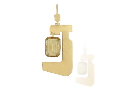 A CITRINE PENDANT, BY PIERRE CARDIN, CIRCA 1970The polished gold plaque suspending a rectangular-cut citrine within claw-sett