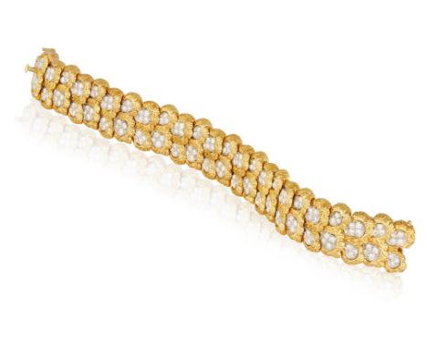 A FINE DIAMOND BRACELET, BY KUTCHINSKY, 1967The articulated strap set with brilliant-cut diamonds throughout, between texture