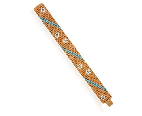 A CORAL, TURQUOISE AND DIAMOND BRACELET, BY ILLARIO, CIRCA 1960The articulated bracelet set throughout with circular coral ca