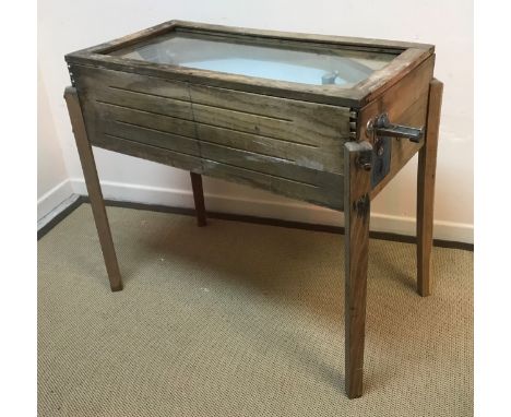 A vintage circa 1940 Ruffler &amp; Walker coin in the slot ice hockey game oak cased 114 cm long x 62 cm wide x 97.5 cm high