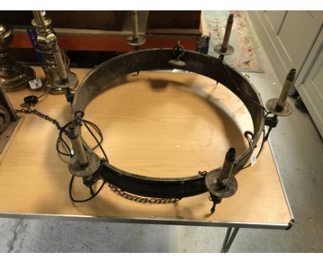 A wrought iron six light electrolier in the Arts &amp; Crafts manner of circular form approx. 84 cm in diameter including sco