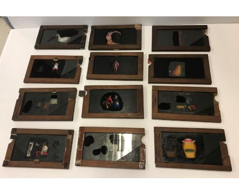 A collection of 23 various Victorian animated magic lantern slides including ten by James Eltoft of Lancaster "Gone to tea", 