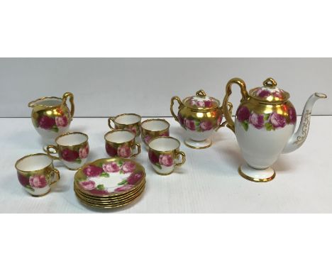 A Royal Albert "Old English Roses" part tea set comprising teapot, twin-handled lidded sucrier, milk jug, six cups and saucer