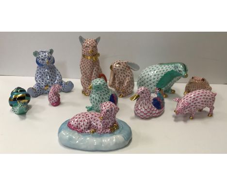 A collection of eleven Herend Hungary animals to include snail, cat, badger, pig etc the largest (cat) 11.5 cm high, the smal