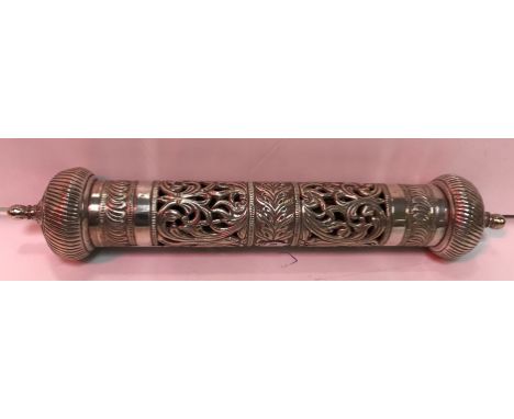 A Burmese white metal and pierced manuscript holder with foliate decoration, 30.5 cm long x 5.3 cm diameter, 312 g