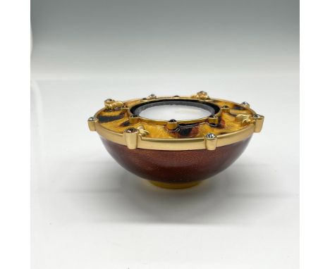Metal enameled holder, Tortoise, has burgundy bowl with yellow and brown ring embellished with Swarovski crystals. Jay Strong