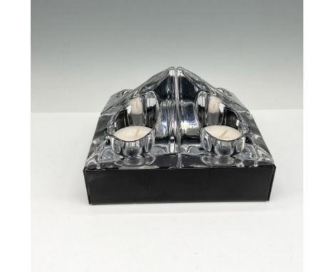 Unique candle design has four crystal holders fitted together forming a spire within a black metal base. Each can be used ind