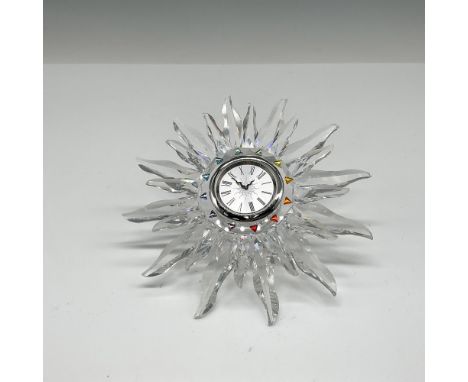 Part of the Exquisite Accents series this beautiful timepiece is designed with clear crystal flares and features multicolored