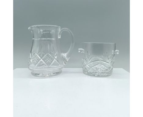 A dazzling set featuring a clear ice bucket and pitcher, each adorned with intricate diamond and leaf-shaped cuts. Dimensions