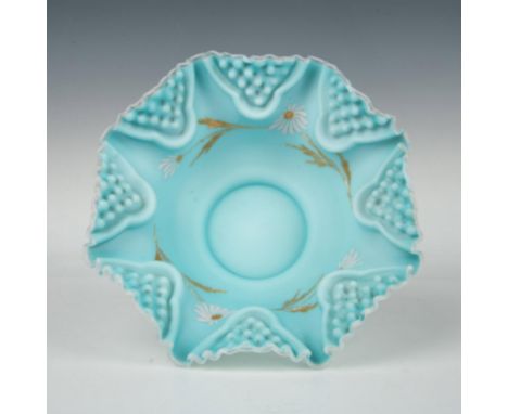 This stunning hand-crafted bowl showcases ruffled sides made from art glass in soft light blue with a satin finish. It is ado