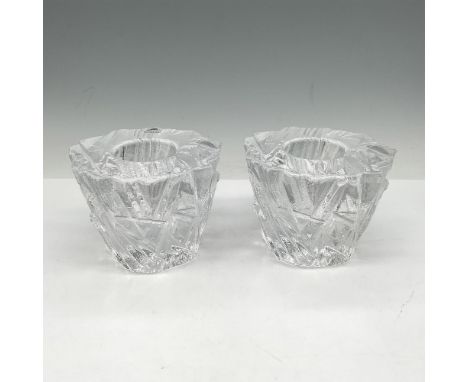 This unique crystalized design resembles ice with clear smooth center to hold candle or tealight. Orrefors acid mark. Issued:
