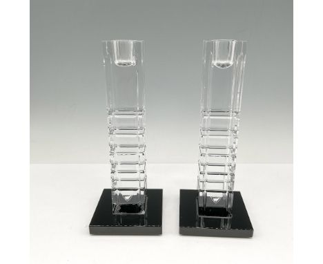 Clear crystal on black base created with modern streamed lines gives the illusion of intersecting streets. Orrefors mark. Art
