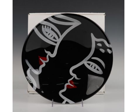 Hand painted black bowl with artist touch of two faces looking at each other drawn in white for contrast. Artist initials low