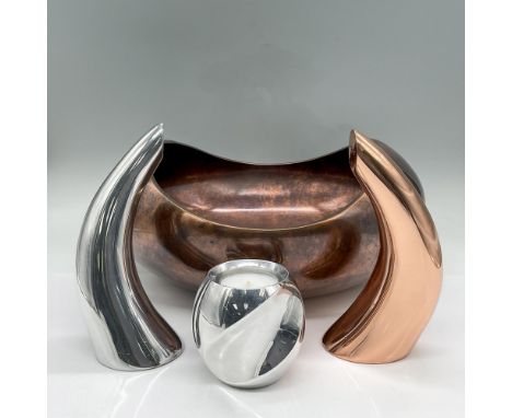 Metal alloy bronze colored art bowl 11.75"L x 12"W x 5.25"H. Silvertone and bronze colored salt and pepper shakers in an angl