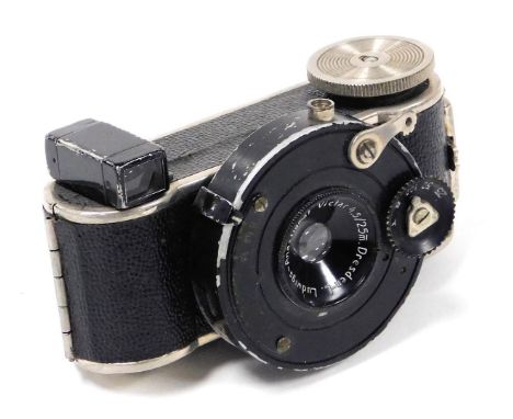 A Minifex patent miniature camera, by E Ludwig of Dresden, with a 2.5mm lens.