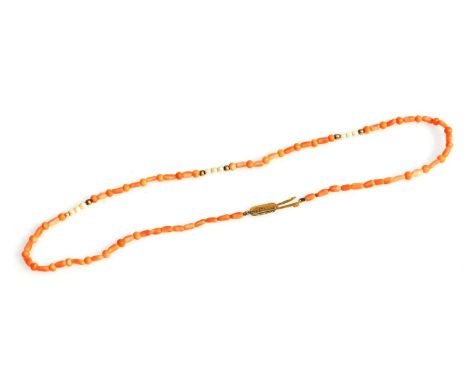 A 9ct gold coral and seed pearl necklace, 43cm long.