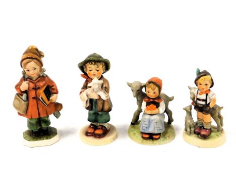 Three Hummel pottery figures, comprising Good Friends, The Lost Sheep, and Little Goat Herder, together with a Fredel pottery