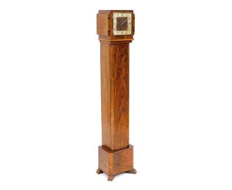 An Art Deco walnut cased grandmother clock, square dial with silvered chapter ring bearing Arabic numerals, strike/silent lev