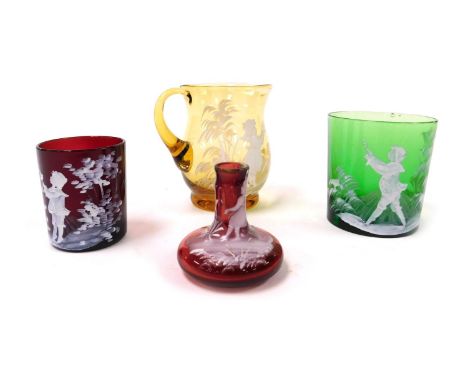 Four pieces of Mary Gregory type glassware, comprising an amber glass cream jug, green glass tumbler, ruby glass spill vase, 