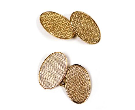 A pair of 9ct rose gold double oval and chain link cuff links, with engine turned decoration, 3.7g.