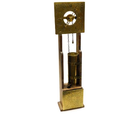 A 20thC Peerage Clepsydra brass water clock, the grey square dial with chapter ring bearing Roman numerals, with water powere