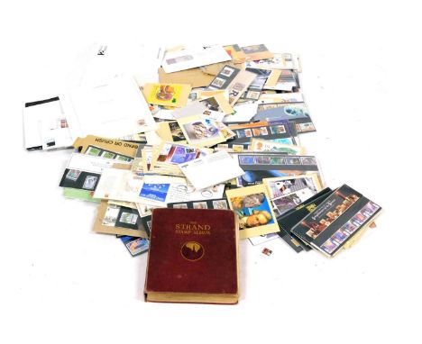 Philately.  An album of QV-GVI definitives and commemoratives, Empire and World stamps, in a Strand stamp album, together wit