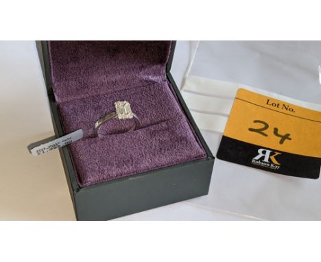 18ct white gold ring with 0.69ct of baguette &amp; round diamonds.  Includes certificate that relates to some of the stones s