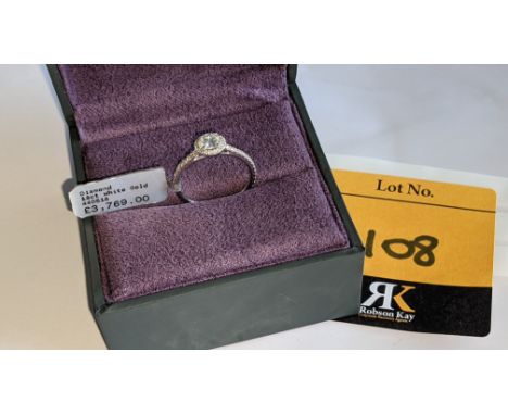 18ct white gold &amp; diamond ring with 0.40ct central stone &amp; 0.45ct of stones in a circle around the central stone plus