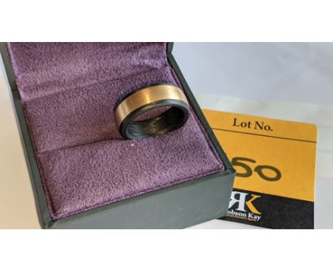 Ring believed to be made of carbon &amp; rose gold - no price sticker or labelling on this ring. The ring is stamped "AU585" 