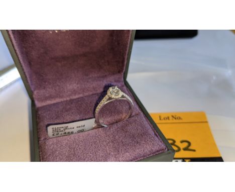 18ct white gold &amp; diamond ring with central 0.40ct oval diamond &amp; 0.22ct of diamonds surrounding the central stone &a