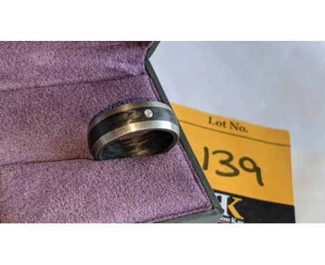 Ring understood to be made of Palladium, carbon &amp; diamond - no price sticker or labelling on this ring. The ring is stamp