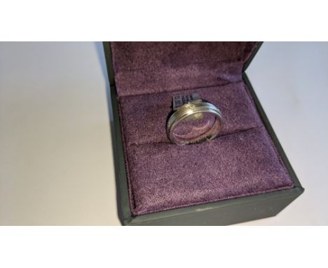 Diamond &amp; platinum ring in platinum 950 with 6 diamonds each 0.01ct in size. RRP £2,150We have used a ring sizer mandrel 