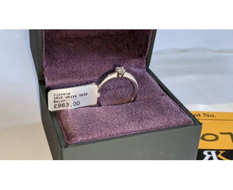 18ct white gold ring with 0.15ct diamond. RRP £963We have used a ring sizer mandrel to determine the inside diameter in mm of