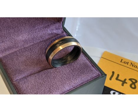 Ring believed to be made of carbon &amp; rose gold - no price sticker or labelling on this ring. The ring is stamped "AU585" 