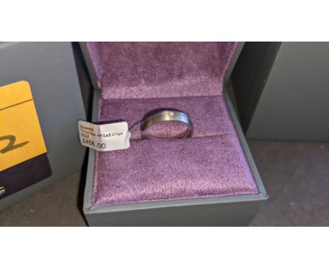 Titanium, platinum &amp; diamond ring RRP £456We have used a ring sizer mandrel to determine the inside diameter in mm of thi