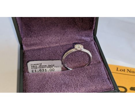 18ct white gold &amp; diamond ring with 0.36ct diamonds on the shoulders &amp; around the central stone. RRP £1,631We have us