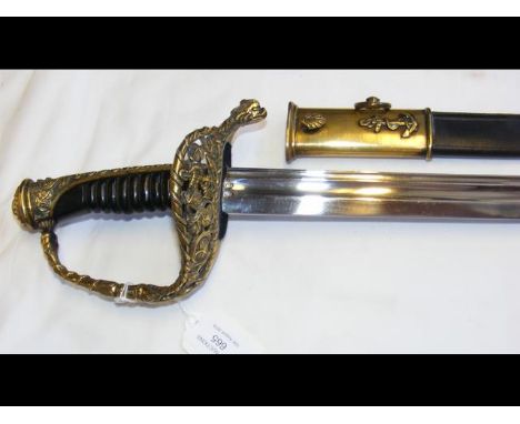 A French Naval Officer's sword with ornate guard and black leather scabbard with gilt mounts CONDITION REPORTas per images