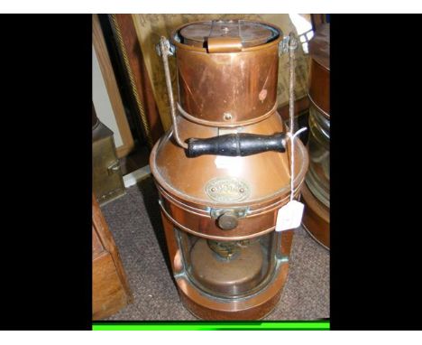 A 44cm early copper paraffin lamp by Griffiths & Sons of Birmingham  