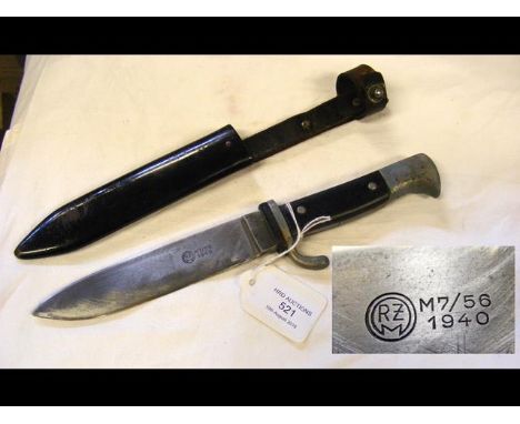 An RZM German knife - the blade marked M7/56 1940 - with metal scabbard 