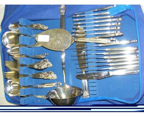 59 pieces of Georg Jensen silver cutlery and a large ladle CONDITION REPORTover 92 oz in total   8 knives - stainless steel b