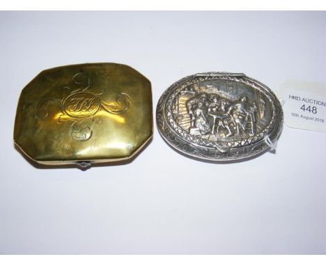 A Dutch silver snuff box with decoration to lid - 7cm, together with a brass snuff box 