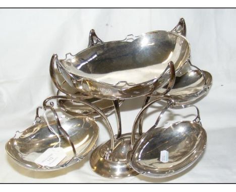 A silver table centre with four swinging baskets - standing 24cm high - Birmingham hallmark CONDITION REPORTGood condition. A