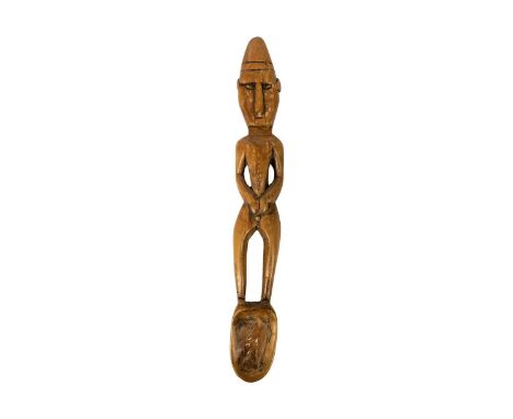 A possible Polynesian wood carved male figural ladle,   Length 49cm.  Maurice Jenkins (1933-2022). North Cornwall collector. 