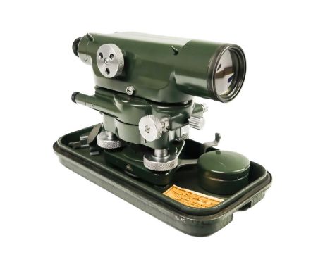 An E R Watts and son microptic level. In a green lacquered case, width 26cm, including a plumb bob and adjustment spanner.