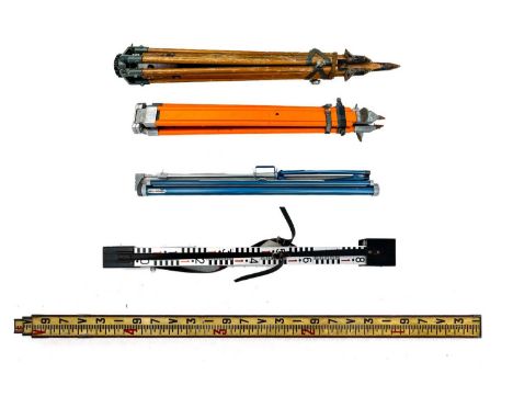 A mahogany and brass bound telescopic surveyor's staff. With original painted scale, height (retracted) 159cm, another alumin