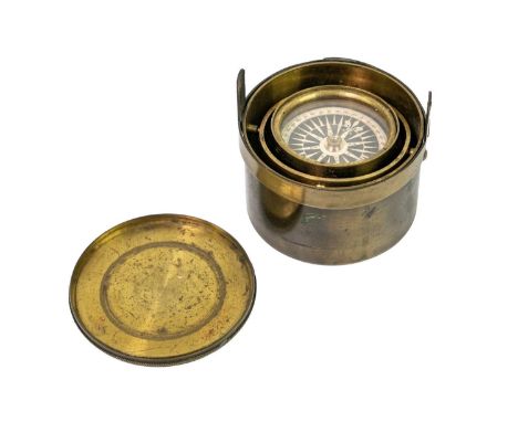 A 19th century brass gimbal mounted pocket compass. Compass diameter 4.5cm.General wear commensurate with age, the compass is