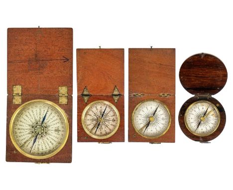 A 19th century travel compass with printed card dial in a square oak case. 5.5cm, Together with three other 19th century trav