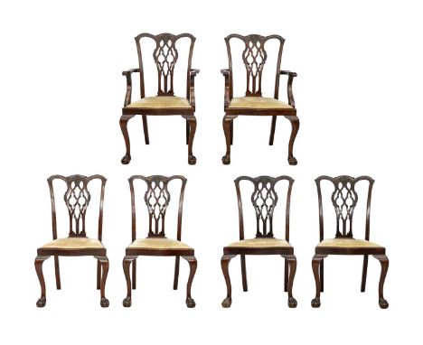 A set of six Chippendale design mahogany dining chairs. Circa 1900, with pierced and carved splats, drop-in seats on cabriole