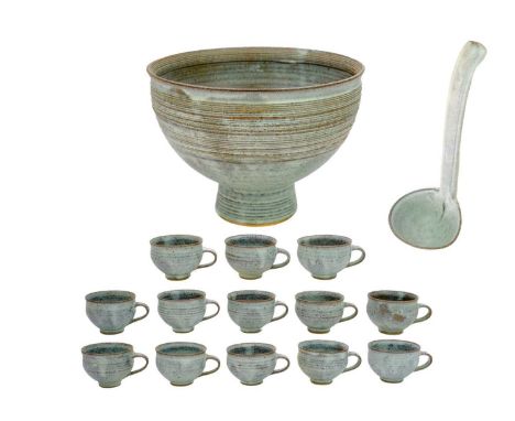 Louis Hanssen (1934-1968) A studio pottery punch bowl, with ladle, and thirteen cups.   Impressed marks. The bowl 29cm high, 
