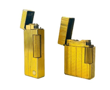 A Dunhill gold plated pocket lighter. Height 6.4cm, together with a DuPont lighter, serial number EK9148 (2).